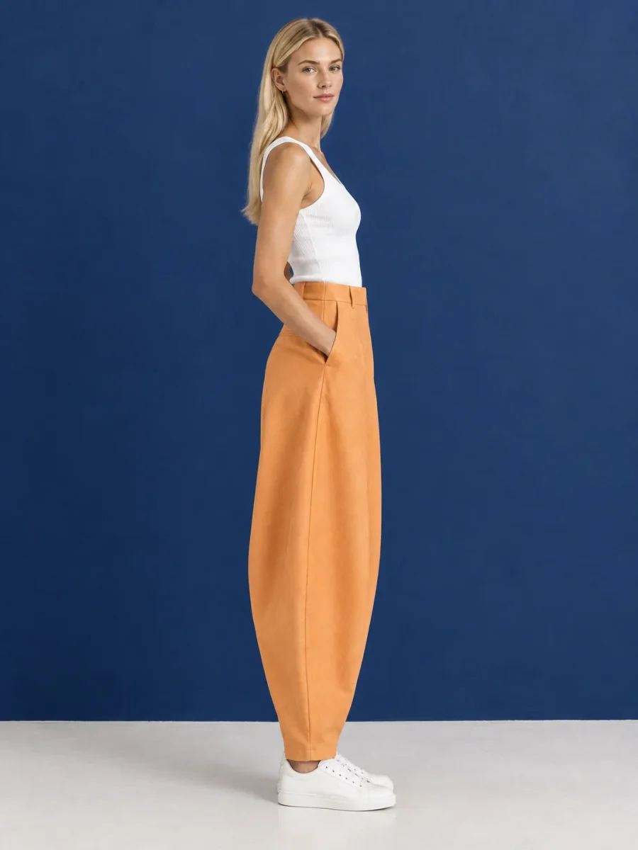 Apricot Curve Trouser, worn, side profile showing the arc