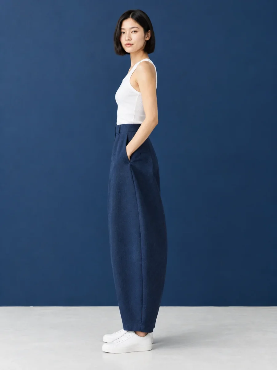 Bracket Tailored Trouser, worn, side profile showing the arc